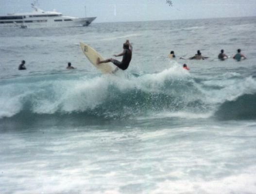 Marcello C. Monteiro enjoying himself, surfing on Ipanema beach.