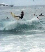 Marcello C. Monteiro enjoying himself, surfing on Ipanema beach.